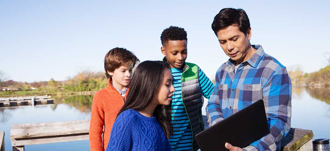 teacher talking with students