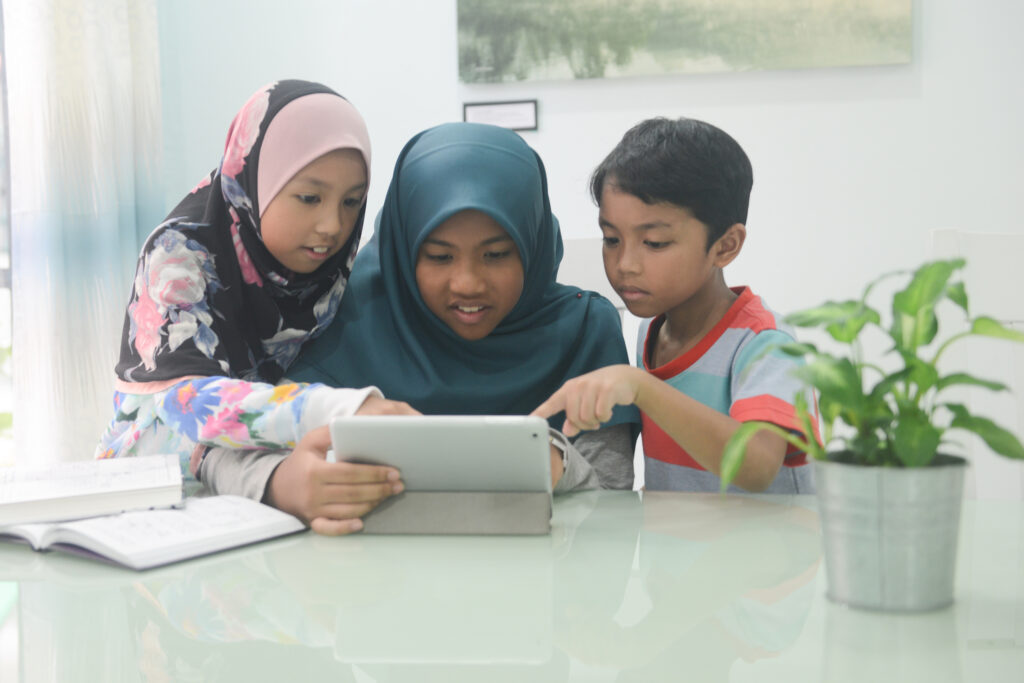 students working on tablet