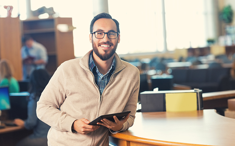 teacher with tablet