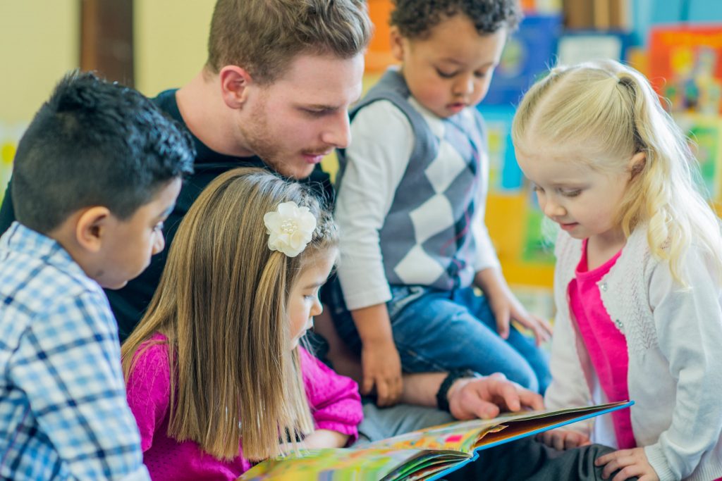 teacher reading to children