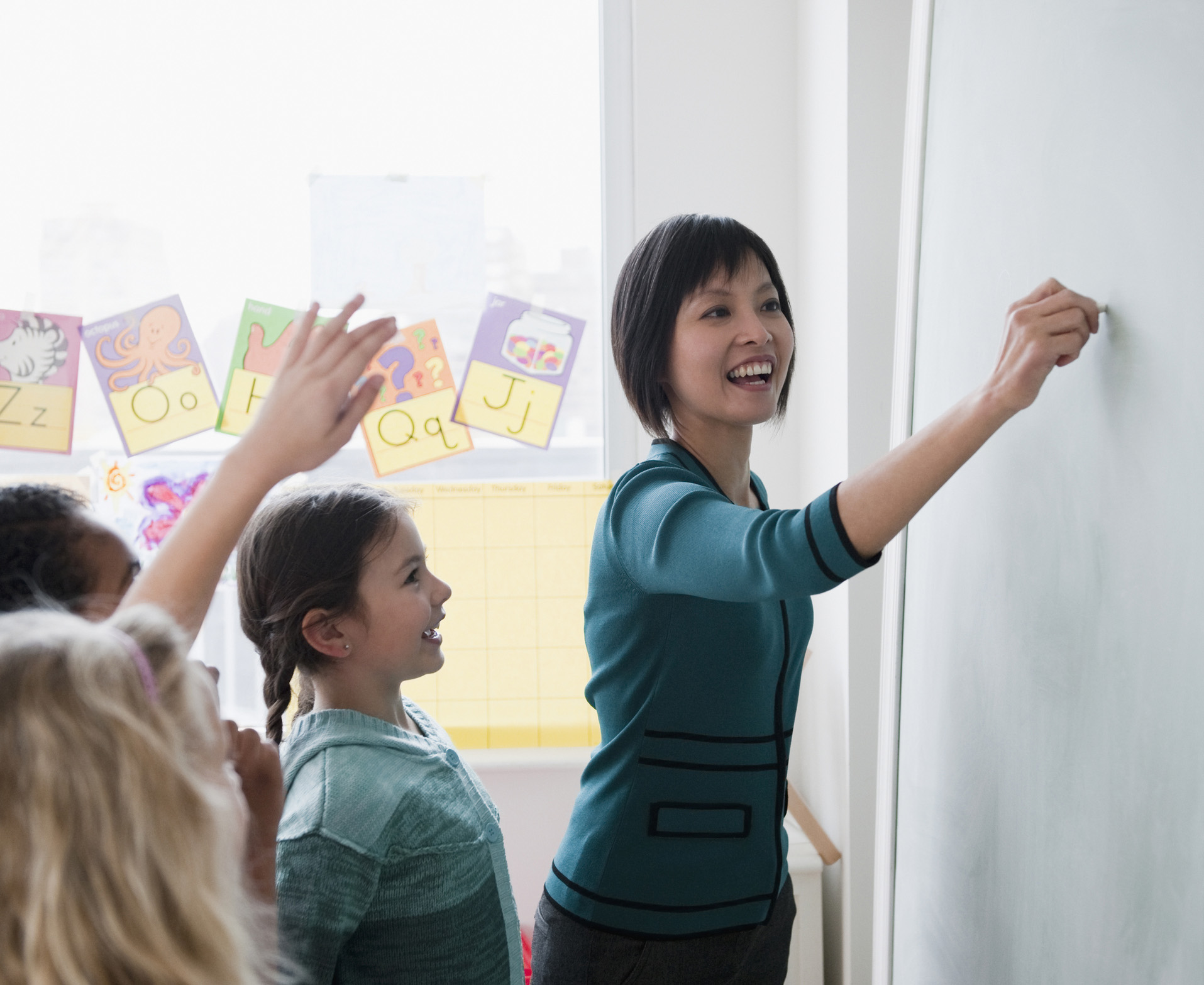 Teacher with young students