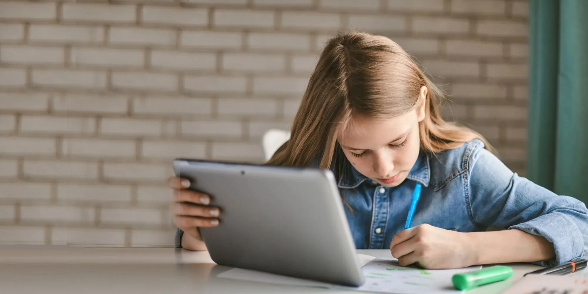 teen girl on tablet