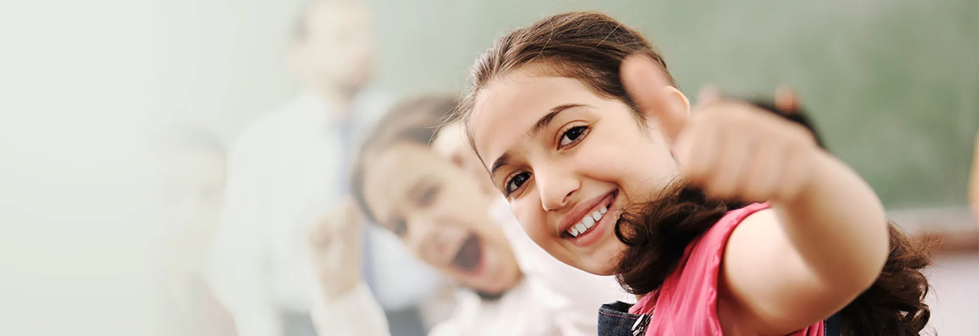 kid giving a thumbs up