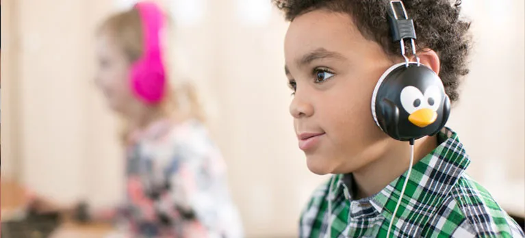 student doing an audio reading assignment