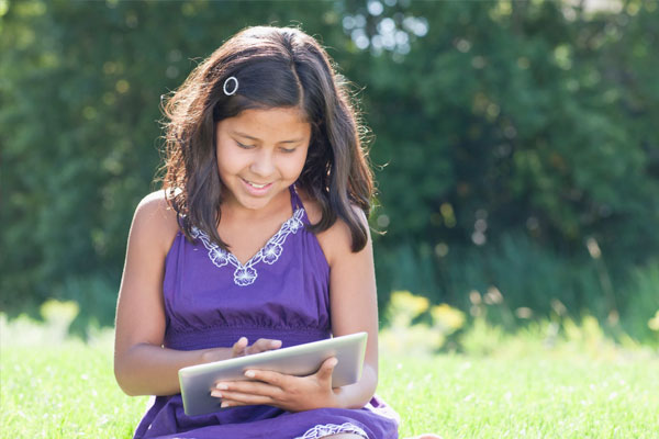 girl reading on a tablet
