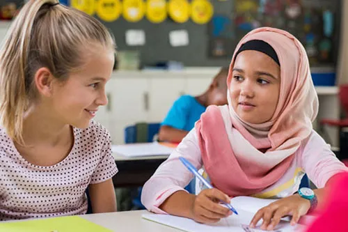 2 girls studying
