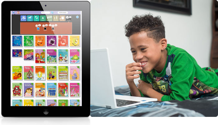A boy reading on a laptop, with myON screenshot.