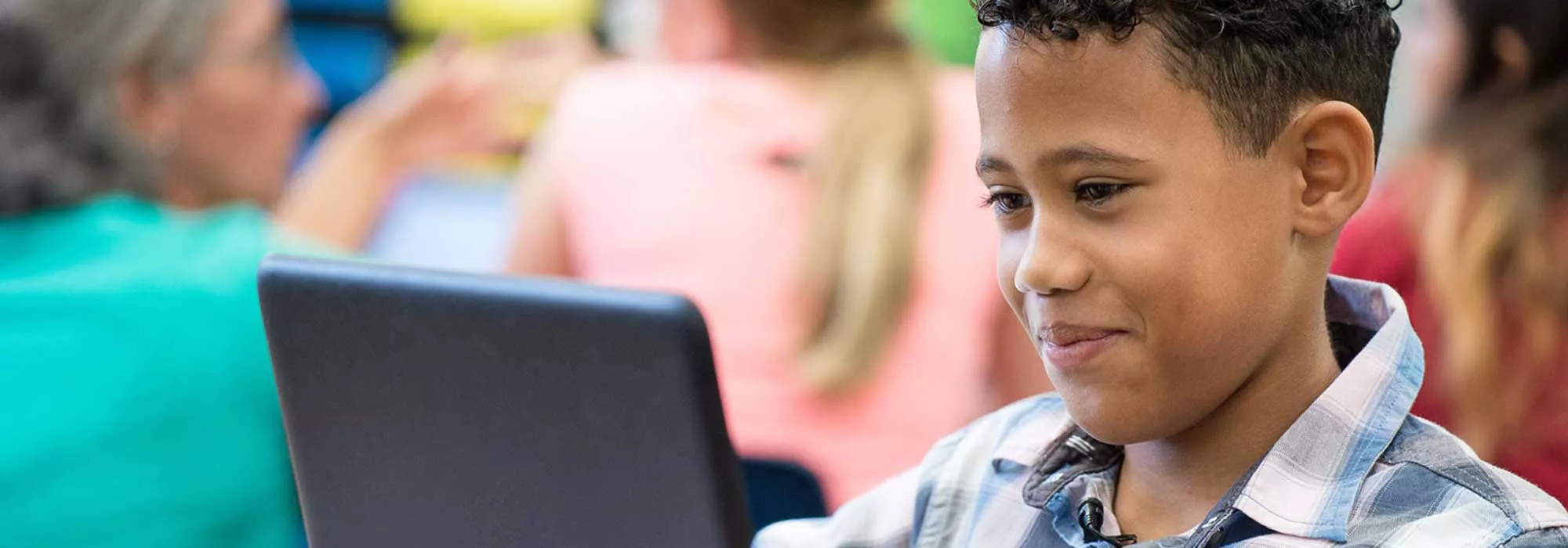 A student using Renaissance myON News on a laptop