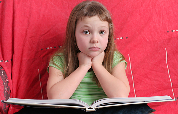 Little girl with a book