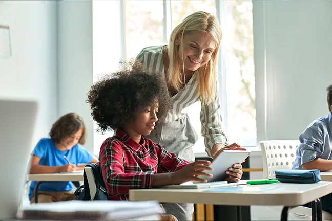 A young boy in a classroom