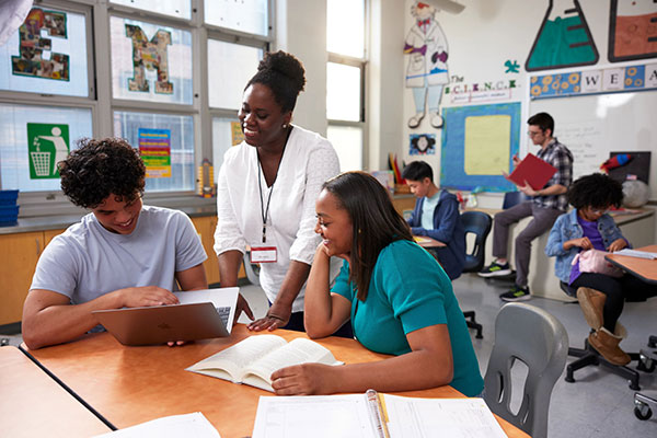 Older students with a teacher