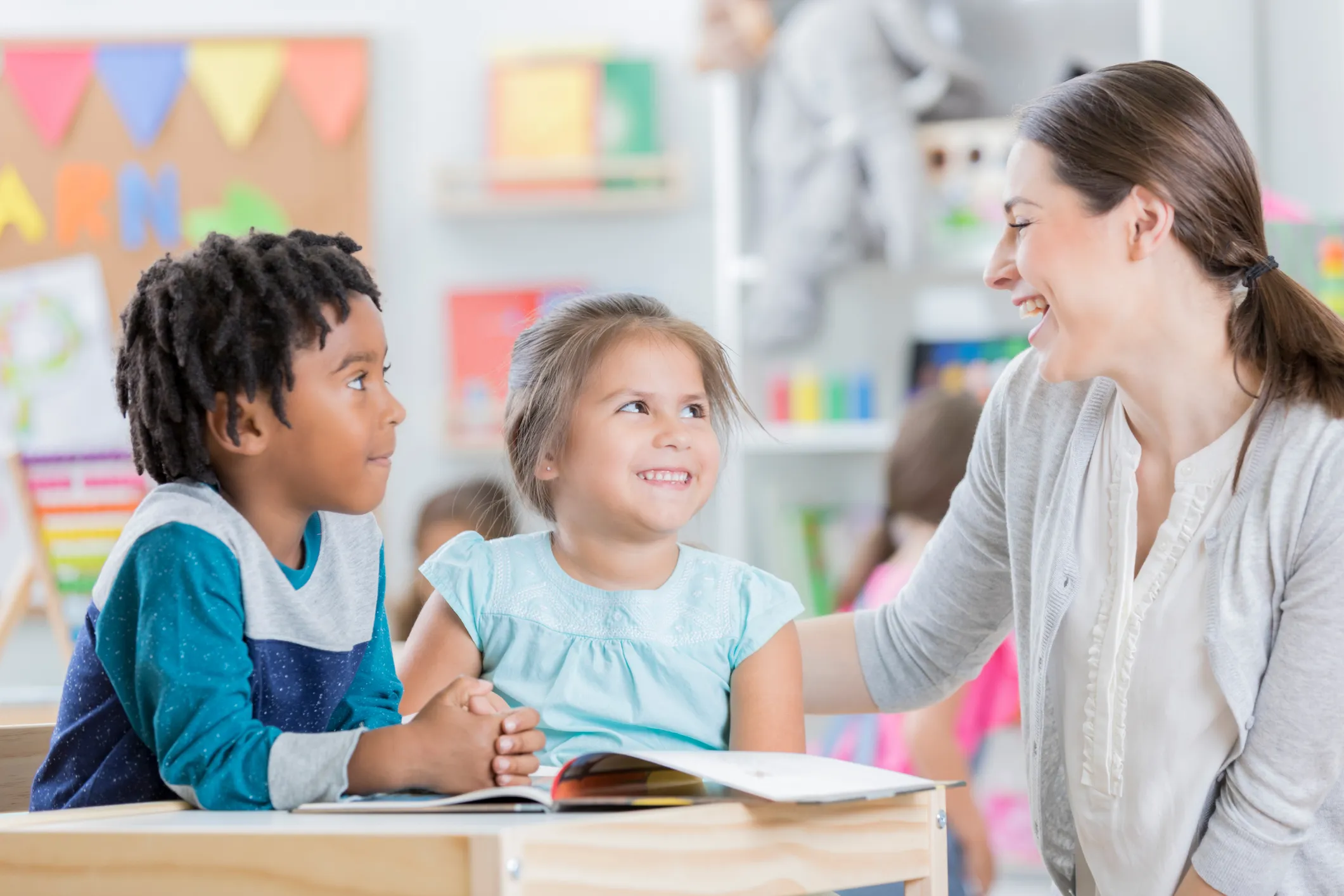 Teacher working with elementary school students