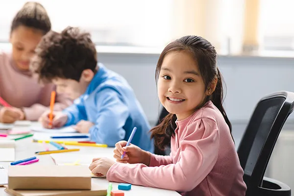 Young female student in class