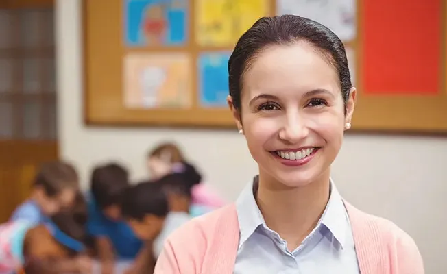A female teacher in her classroom