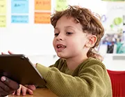 A young student using Accelerated Reader in class