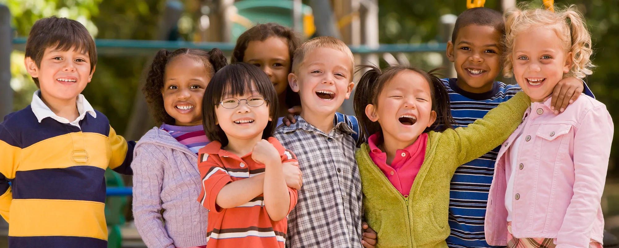 a diverse group of kids in a school yard